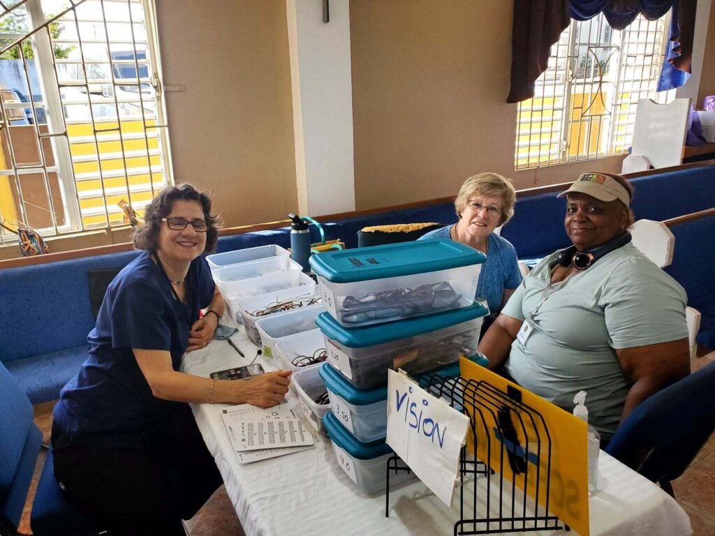 Volunteers delivering care packages or organizing community resource kits (non-hospital/non-clinical)